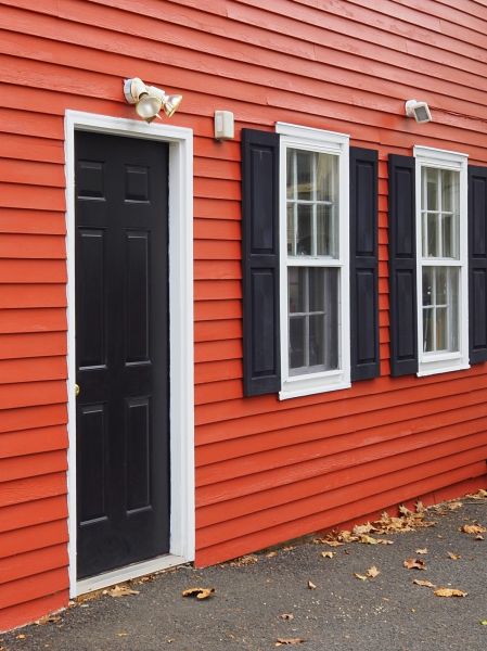 Red Vinyl Siding Installation in San Marcos