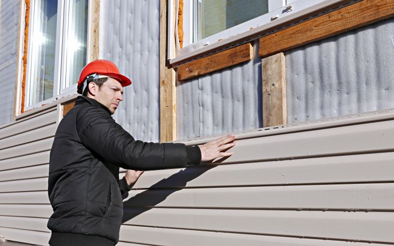 Red Vinyl Siding Installation